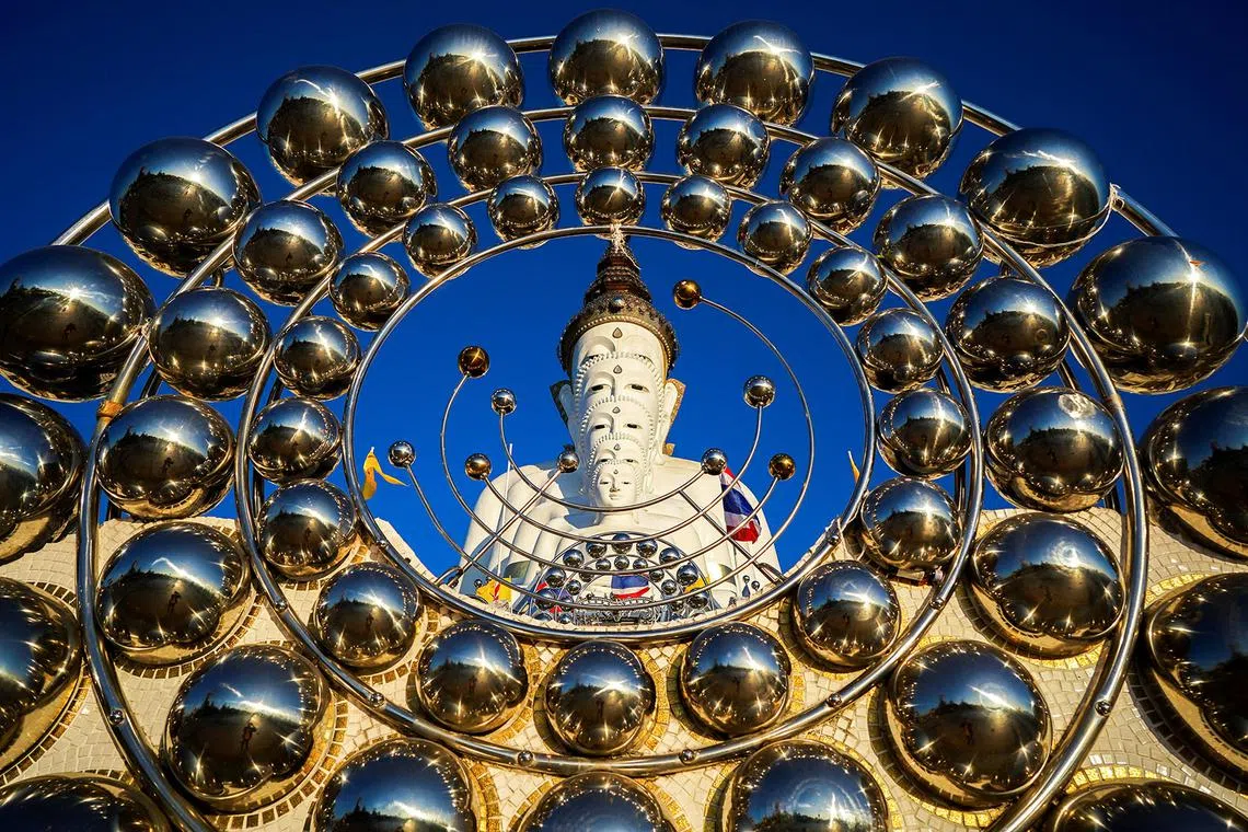 Buddha statues are seen at Wat Phra That Pha Sorn Kaew temple, Khao Kho district, Phetchabun province, Thailand, Dec 17, 2024. 