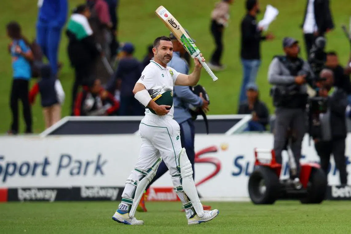 Cricket - First Test - South Africa v India - SuperSport Park Cricket Stadium, Centurion, South Africa - December 27, 2023 South Africa’s Dean Elgar gestures to the fans as the match is delayed by bad light REUTERS/Esa Alexander
