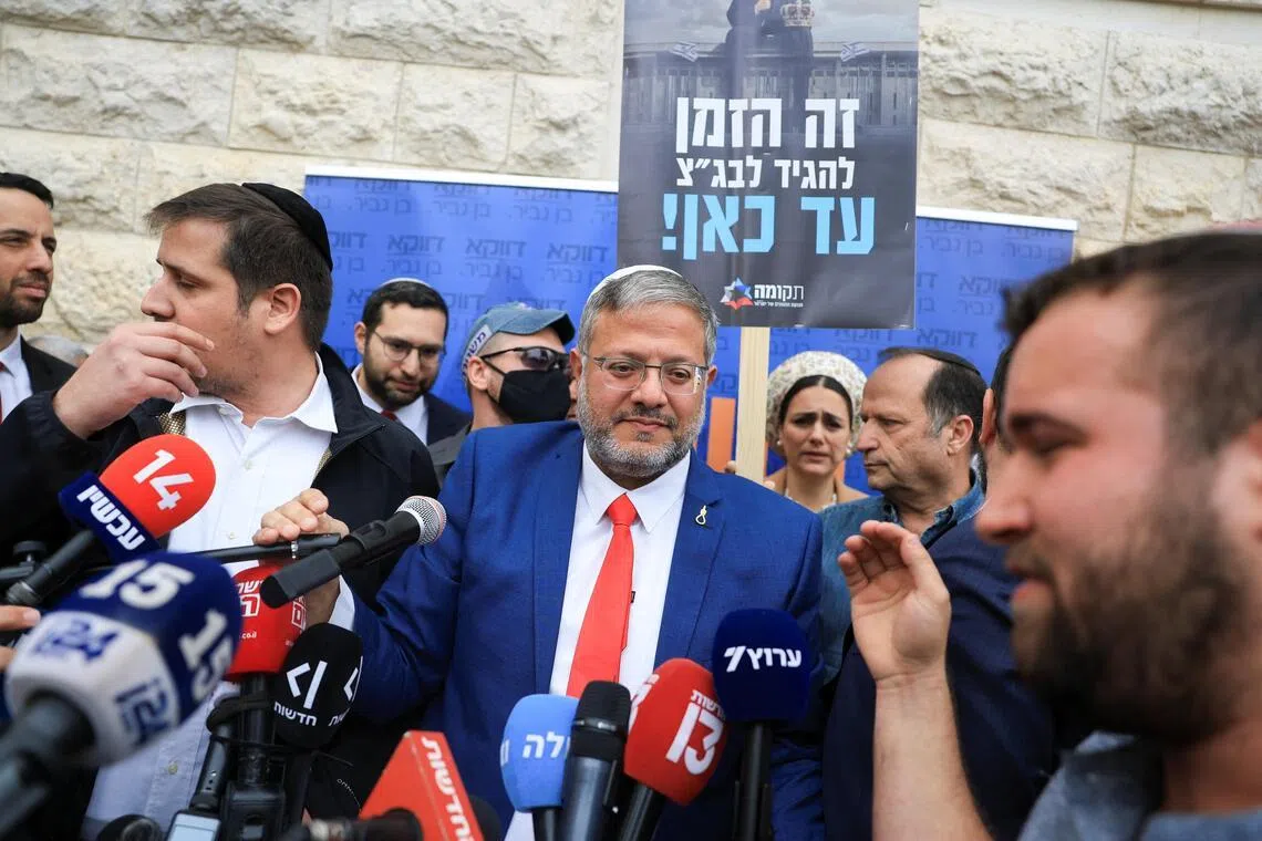 Israeli National Security Minister Itamar Ben-Gvir speaks to members of the media on the day the Supreme Court hears a petition seeking to force Prime Minister Benjamin Netanyahu to oust him, in Jerusalem, on April 15, 2026.