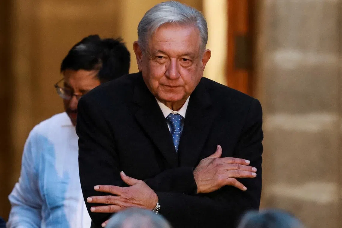 FILE PHOTO: Mexico's President Andres Manuel Lopez Obrador gestures as he attends the 85th anniversary of Mexico's National Institute of Anthropology and History (INAH), at the National Museum of World Cultures, in Mexico City, Mexico February 6, 2024. REUTERS/Henry Romero/File Photo