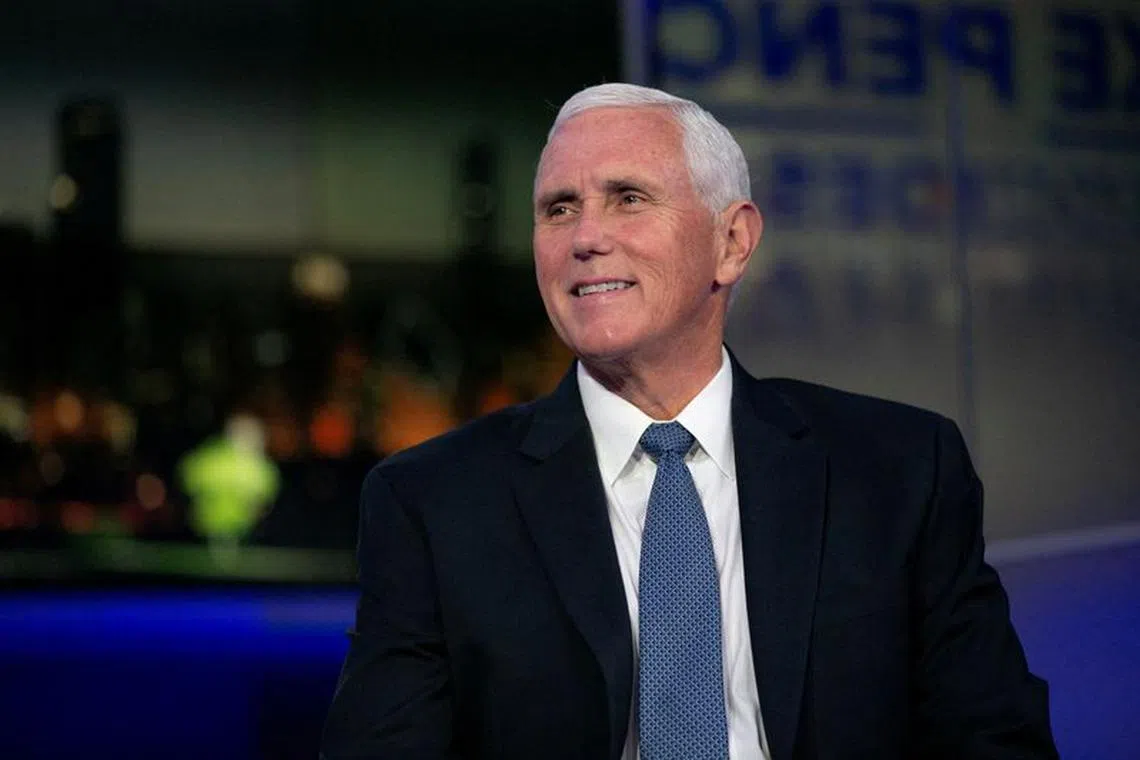FILE PHOTO: Republican presidential candidate and former U.S. Vice President Mike Pence sits down with NewsNation anchor Leland Vittert (not pictured) for a town hall event at NewsNation's headquarters in Chicago, Illinois, U.S., September 13, 2023. REUTERS/Jim Vondruska/File Photo