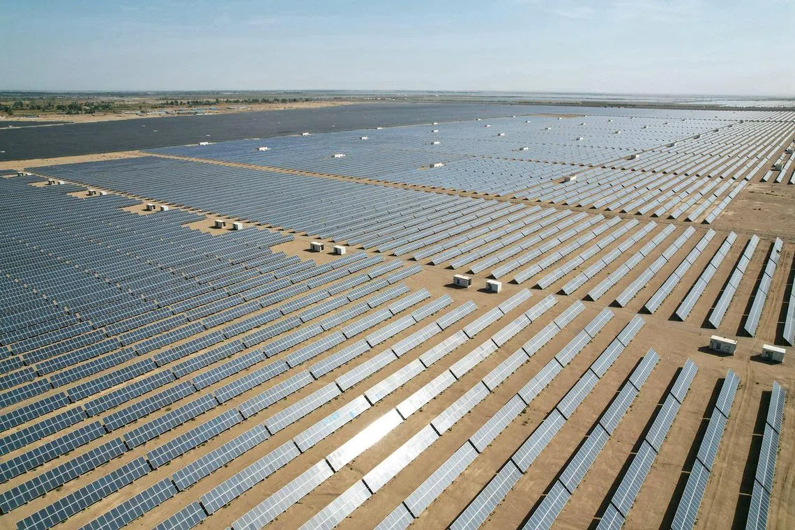 China is by far the world's largest investor in renewable energy but is also building new coal-fired power stations to ensure energy security. (Photo by AFP) / China OUT