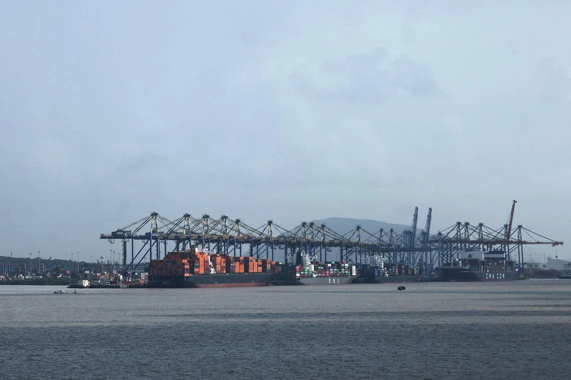 Shipping containers are seen on a ship at the Jawaharlal Nehru Port in Navi Mumbai, India, August 11, 2025. REUTERS/Francis Mascarenhas