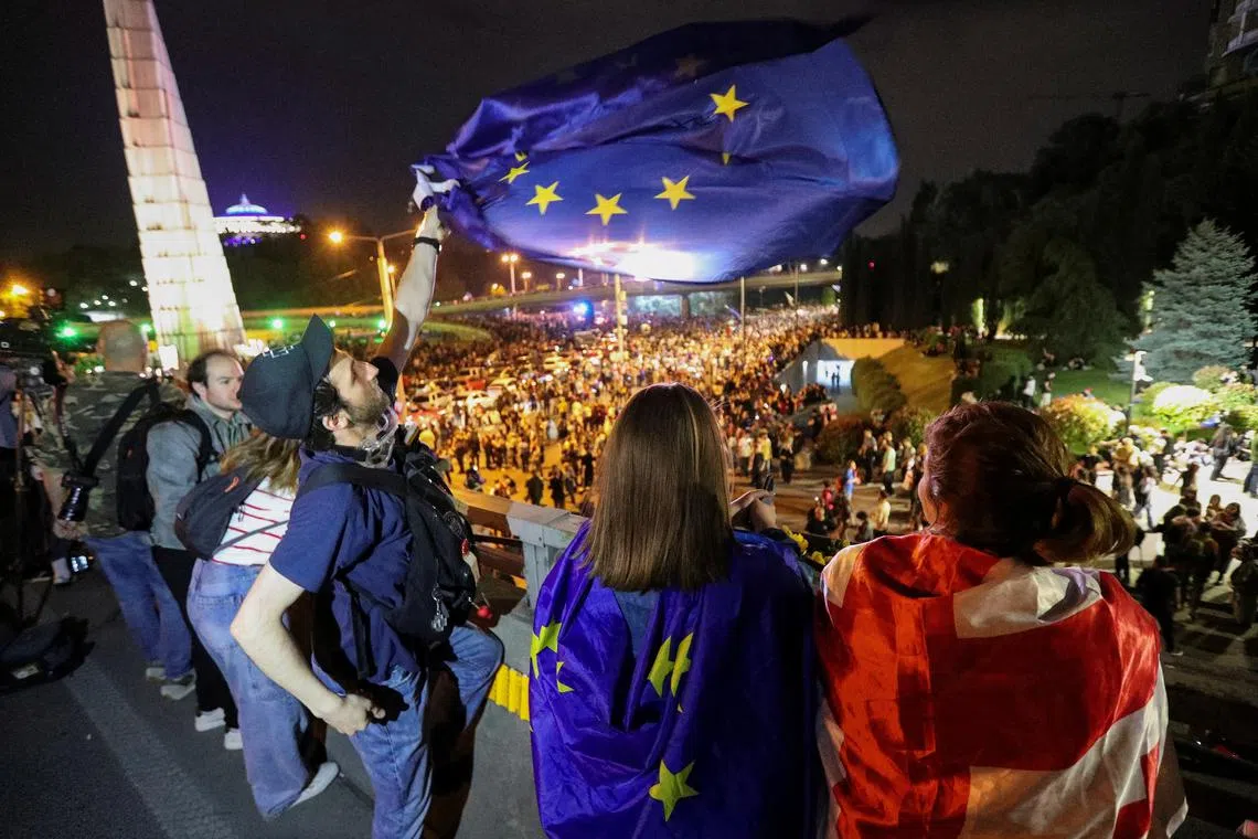 Demonstrators hold a rally to protest against a bill on \"foreign agents\" in Tbilisi, Georgia, May 2, 2024. REUTERS/Irakli Gedenidze/ File Photo