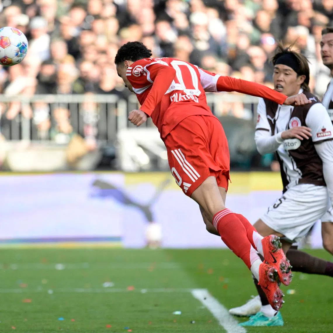 Soccer Football - Bundesliga - St. Pauli v Bayern Munich - Millerntor-Stadion, Hamburg, Germany - April 11, 2026 Bayern Munich's Jamal Musiala scores their first goal REUTERS/Fabian Bimmer