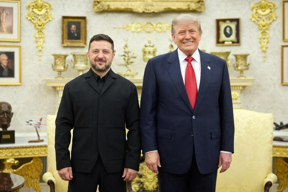 Ukrainian President Volodymyr Zelensky (left) and US President Donald Trump posing for a photo during their July 28 meeting at the White House.