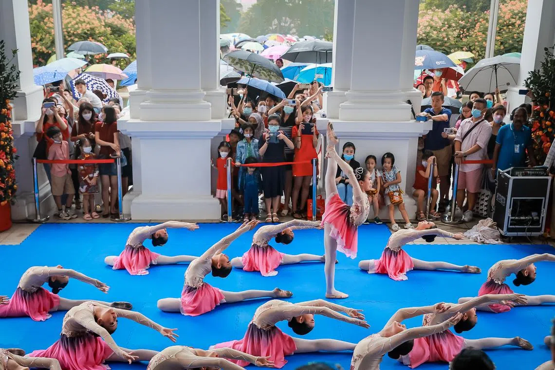 Visitors watching a performance at the Istana Open House on Jan 23, 2023.