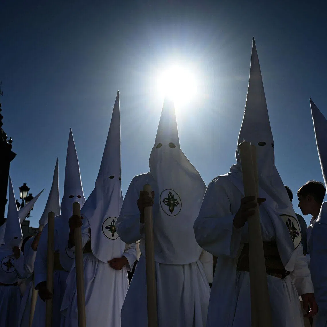 Penitents of the San Gonzalo brotherhood taking part in the Holy Monday procession in Seville, Spain, on March 30, 2026. Christian believers around the world mark Holy Week in celebration of the crucifixion and resurrection of Jesus Christ. 