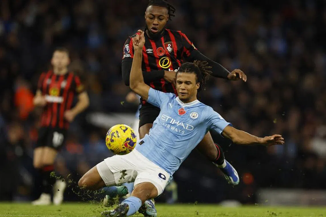 FILE PHOTO: Soccer Football - Premier League - Manchester City v AFC Bournemouth - Etihad Stadium, Manchester, Britain - November 4, 2023 AFC Bournemouth's Antoine Semenyo in action with Manchester City's Nathan Ake Action Images via Reuters/Jason Cairnduff/File Photo