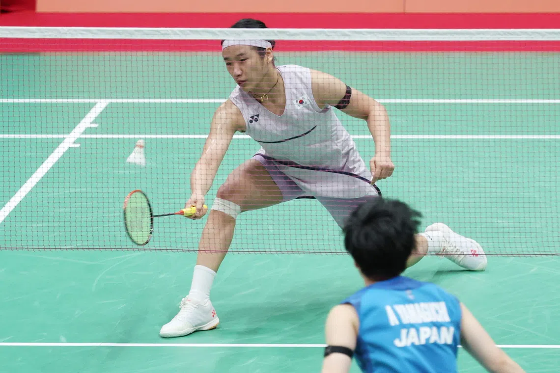 South Korea’s An Se-young returns a shot against Japan’s Akane Yamaguchi at the Asian Games team event semi-finals.
