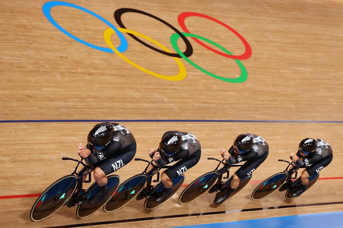 FILE PHOTO: Tokyo 2020 Olympics - Cycling - Track - Men's Team Pursuit - Qualification - Izu Velodrome, Shizuoka, Japan - August 2, 2021. Aaron Gate of New Zealand, Campbell Stewart of New Zealand, Regan Gough of New Zealand and Jordan Kerby of New Zealand/File Photo