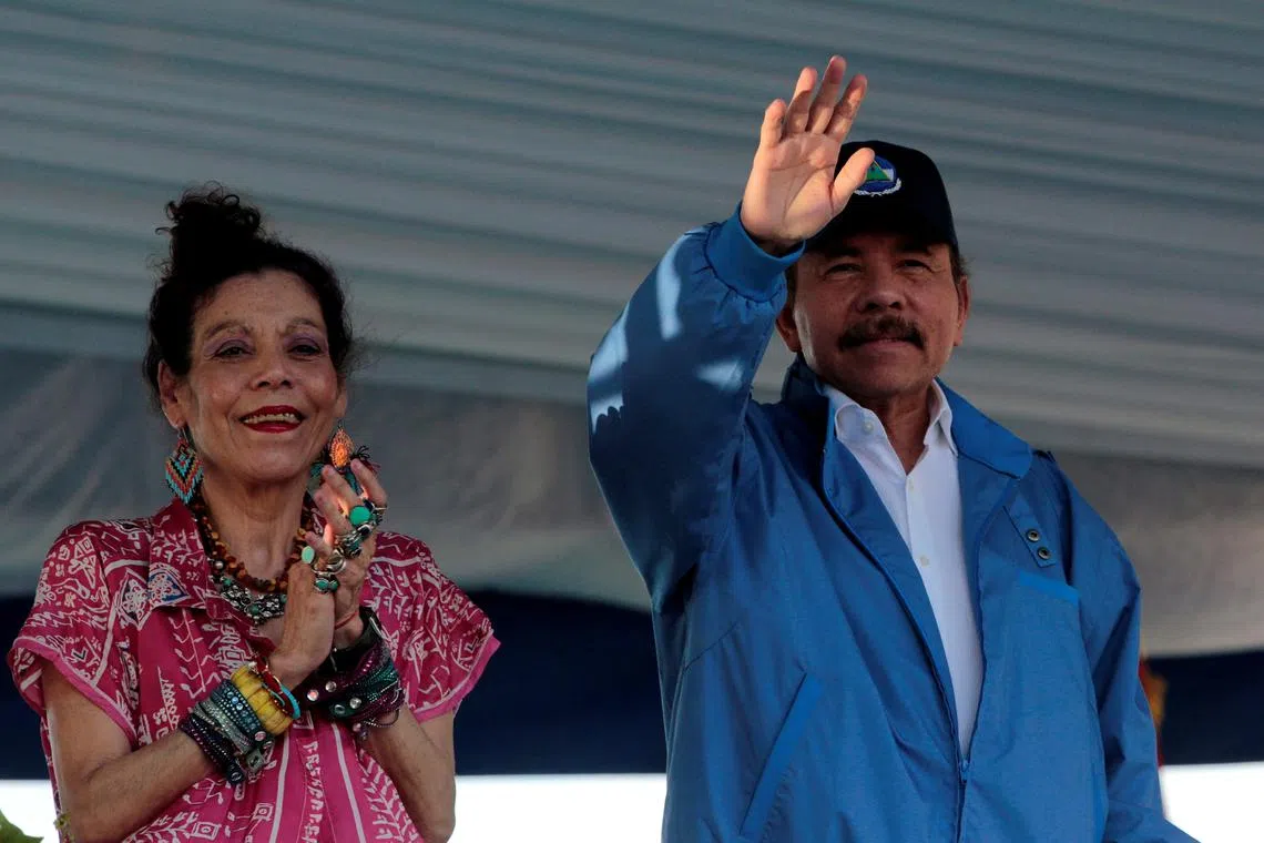 FILE PHOTO: Nicaragua's President Daniel Ortega and Vice President Rosario Murillo greet supporters during an event to commemorate the 40th anniversary of the taking of the national palace by Sandinistas guerrilla in 1978, in Managua, Nicaragua August 22, 2018. REUTERS/Oswaldo Rivas/File Photo