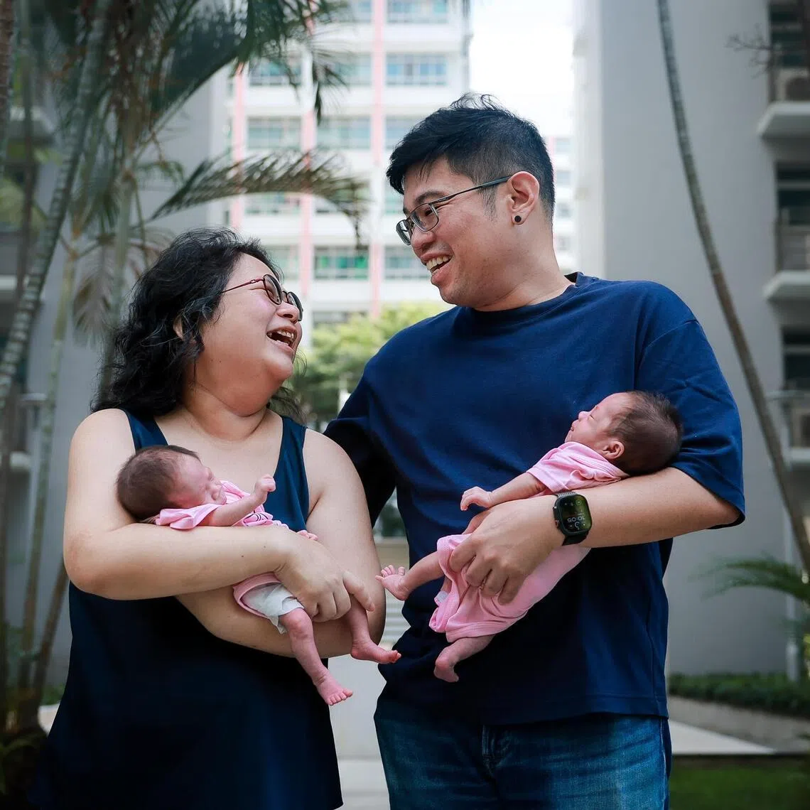 Ms Josephine Foong, 41, with her husband, Mr Winston Yip, 42, and their twin daughters Anya (left) and Annette.