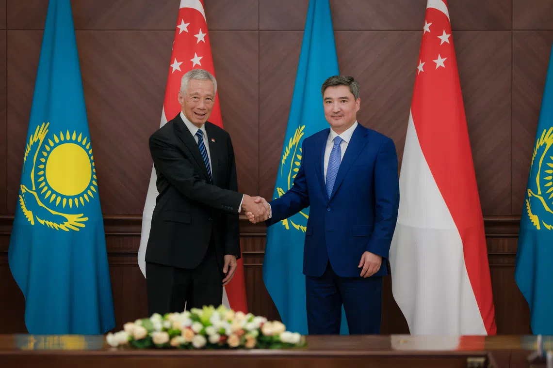 Senior Minister Lee Hsien Loong calls on Kazakhstan Prime Minister Olzhas Bektenov at Ukimet Ui (Government House) in Astana on Aug 26.