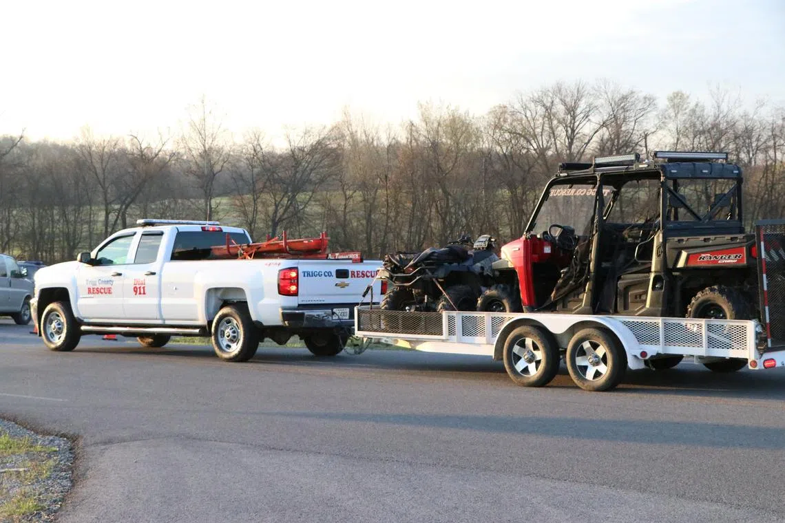 Rescue vehicles at the site where two US Army Black Hawk helicopters crashed in Trigg County, Kentucky, on March 30, 2023. 