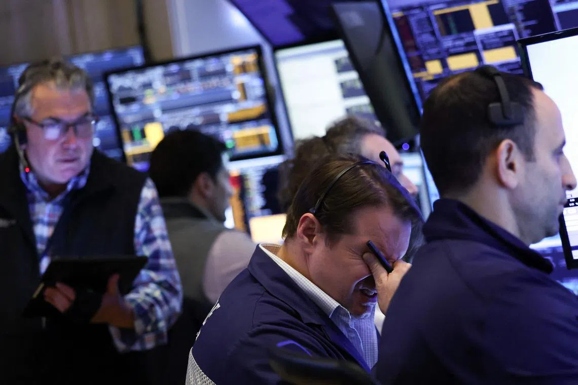 Traders working on the floor of the New York Stock Exchange, at the opening bell on April 3.
