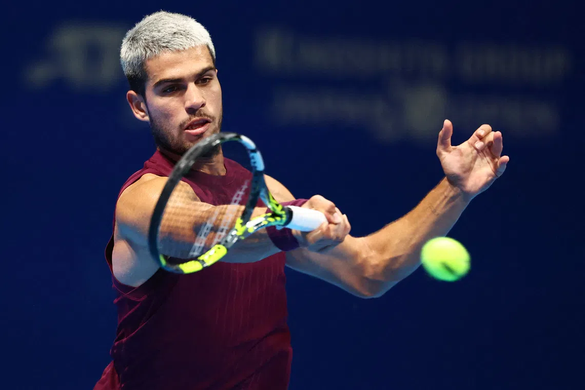 Tennis - ATP 500 - Japan Open Tennis Championships - Ariake Coliseum, Tokyo, Japan - September 30, 2025 Spain's Carlos Alcaraz in action during the final against Taylor Fritz of the U.S. REUTERS/Issei Kato