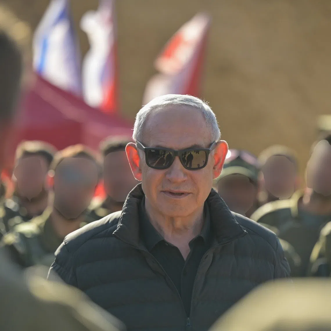Israeli Prime Minister Benjamin Netanyahu visiting troops at a buffer zone inside Syria on Nov 19, in a photo released by his office.