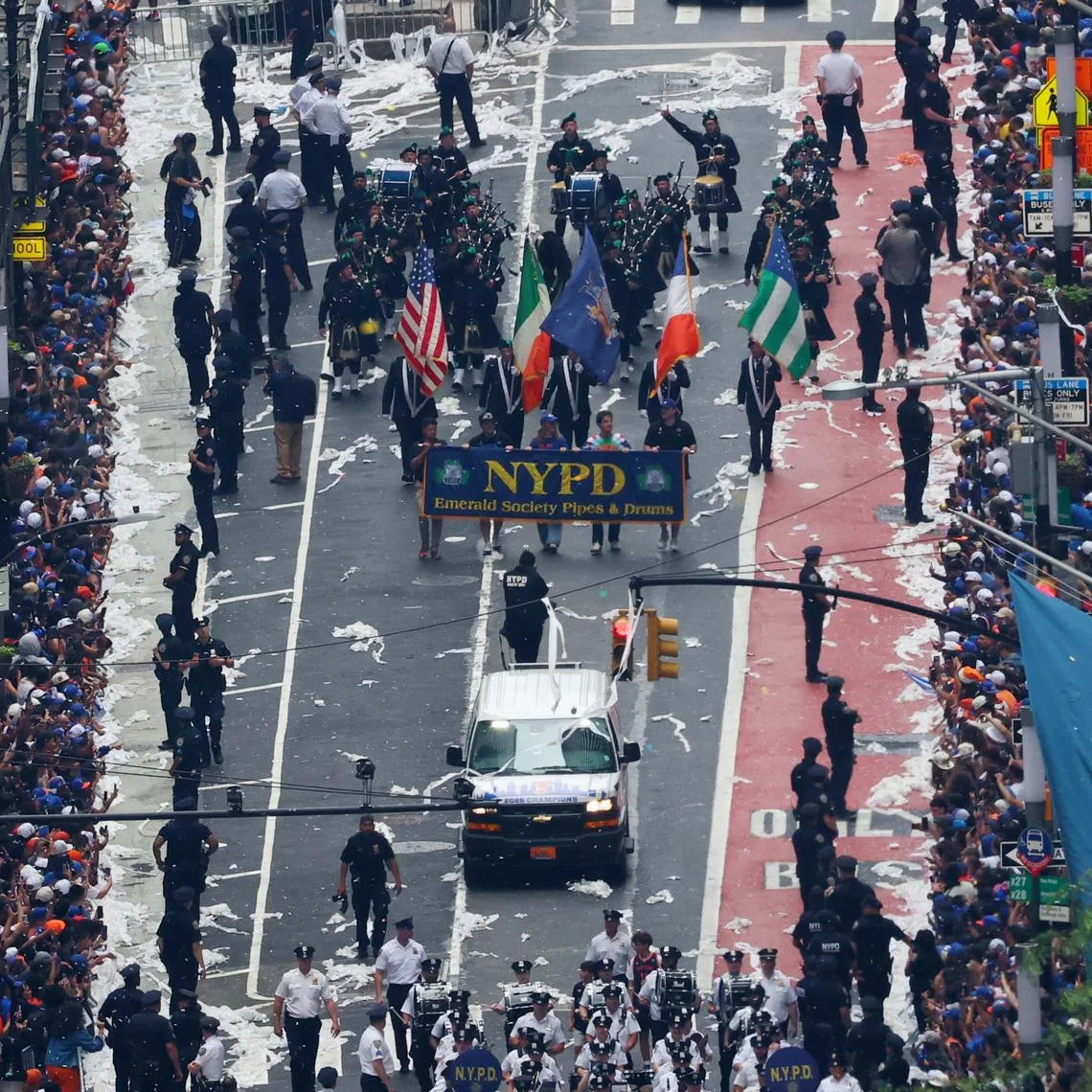 Basketball - NBA - New York Knicks Parade - Woolworth Building, New York City, New York, U.S. - June 18, 2026 General view from the Woolworth Building in New York City of the NYPD police escort as the parade travels along Broadway REUTERS/Mike Segar