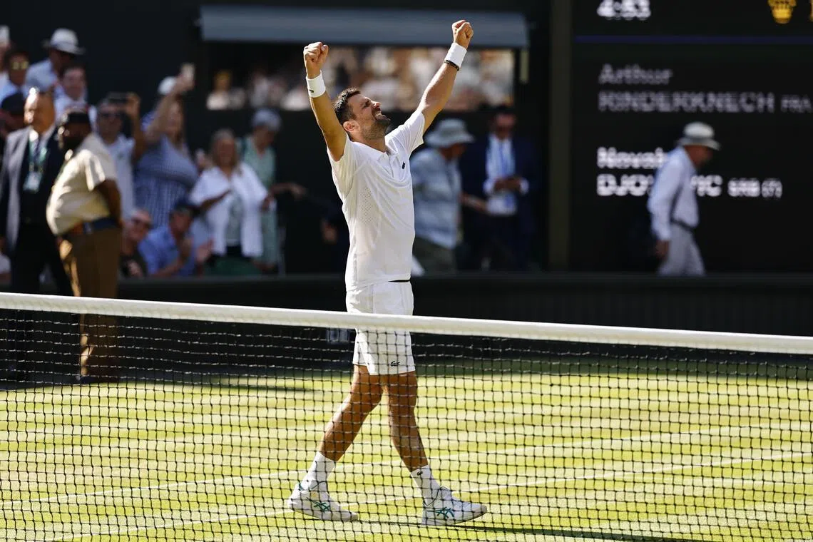 epa13083507 Novak Djokovic of Serbia celebrates after winning his Men's Singles third round match against Arthur Rinderknech of France at the Wimbledon Championships in London, Britain, 03 July 2026.  EPA/TOLGA AKMEN