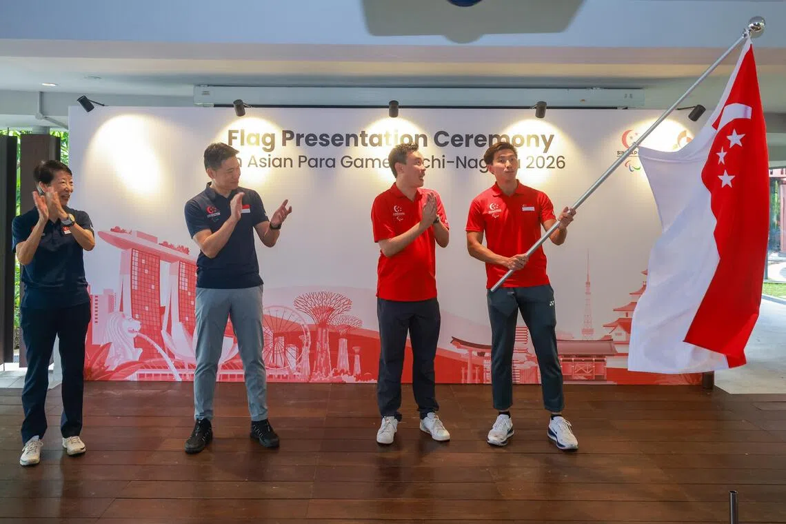 (From left) Singapore National Paralympic Council president Teo-Koh Sock Miang; Minister for Culture, Community and Youth David Neo; Team Singapore chef de mission for the 2026 Asian Para Games Low See Lien; Singapore flagbearer James Ang at the Team Singapore Flag Presentation Ceremony for the 5th Asian Para Games Aichi-Nagoya 2026 on Sep 12.