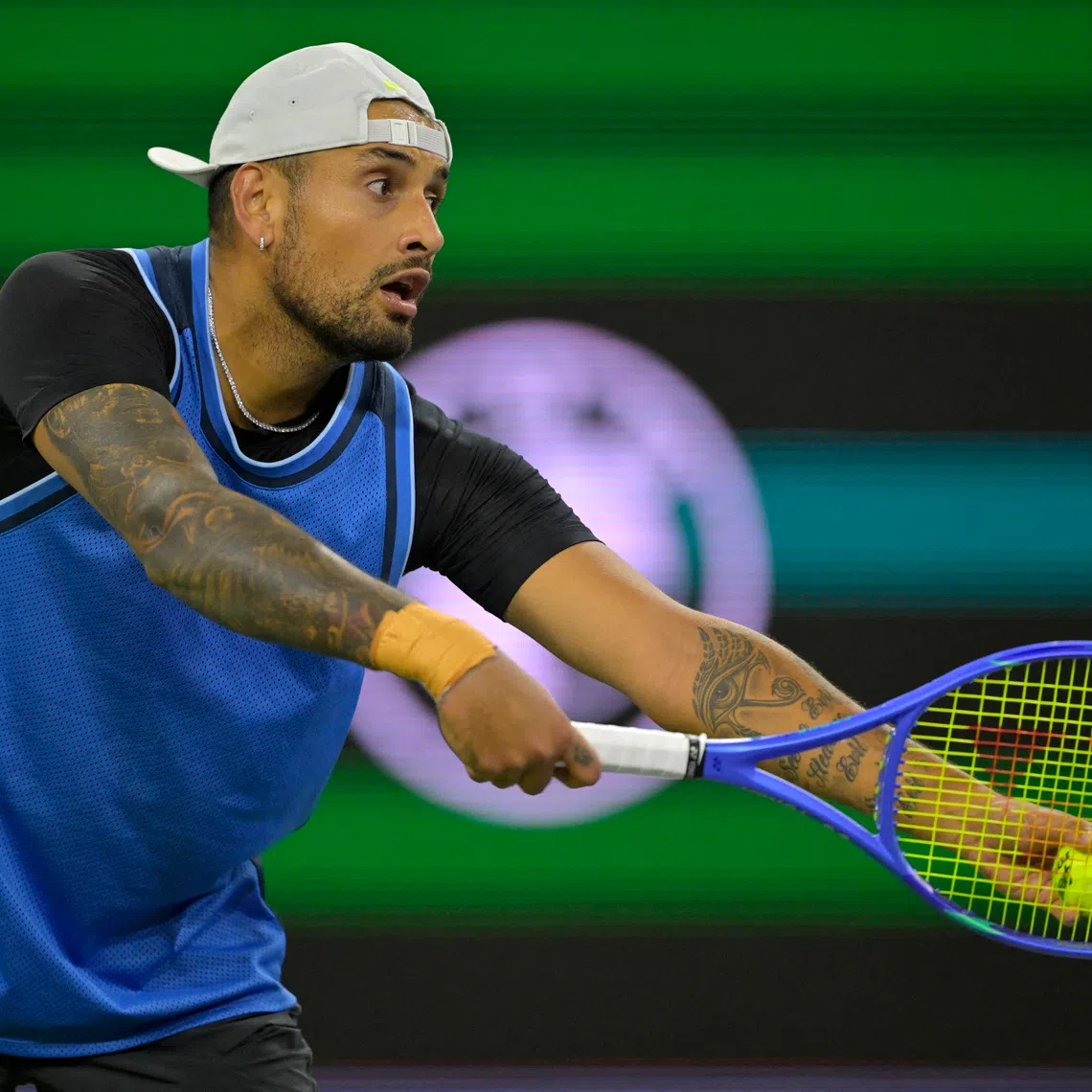 Mar 6, 2025; Indian Wells, CA, USA;  Nick Kyrgios (AUS) serves against Botic Van De Zandschulp (not pictured) during his first round match of the BNP Paribas Open at the Indian Well Tennis Garden. Mandatory Credit: Jayne Kamin-Oncea-Imagn Images
