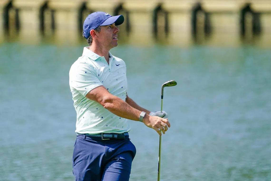 Mar 13, 2026; Ponte Vedra Beach, Florida, USA; Rory McIlroy watches his approach shot to the 18th hole during the second round of THE PLAYERS Championship golf tournament. Mandatory Credit: Jeff Romance-Imagn Images
