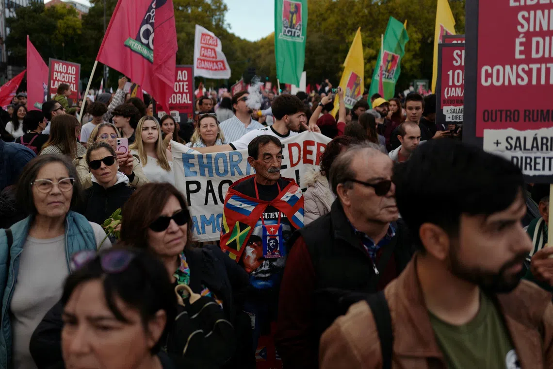 People attend a demonstration held by the General Confederation of the Portuguese Workers (CGTP) demanding better wages and working conditions, in Lisbon, Portugal, November 8, 2025. REUTERS/Pedro Nunes