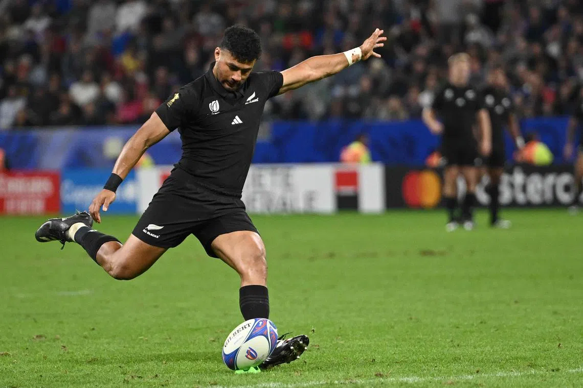 New Zealand's fly-half Richie Mo’unga scoring a conversion during the France 2023 Rugby World Cup Pool A match between New Zealand and Uruguay at the OL Stadium on Oct 5.