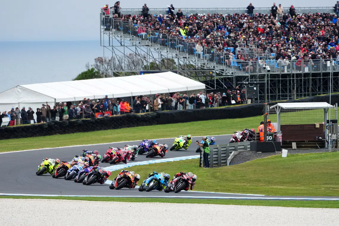 FILE PHOTO: MotoGP - Australian Grand Prix - Phillip Island Grand Prix Circuit, Phillip Island, Australia - October 19, 2025 General view of riders in action at the start of MotoGP race via REUTERS/Asanka Brendon Ratnayake/File Photo