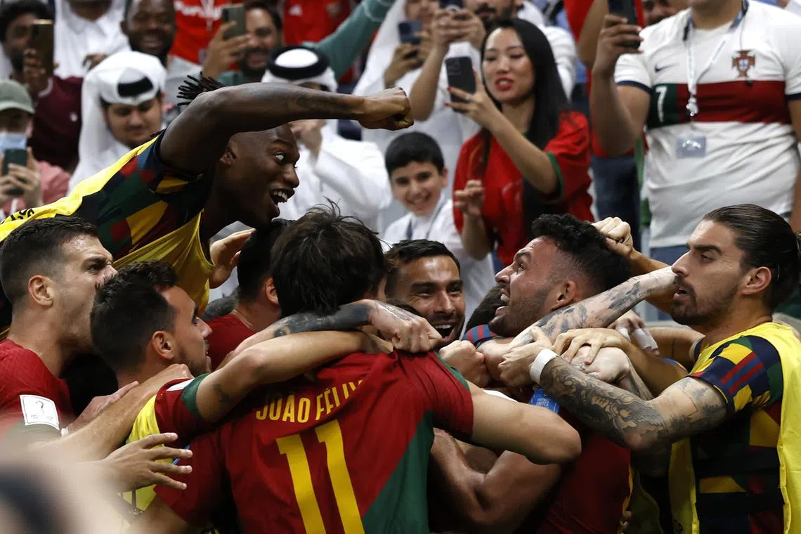 Goncalo Ramos (CR) of Portugal celebrates with teammates after scoring the opening goal during the FIFA World Cup 2022 round of 16 soccer match between Portugal and Switzerland at Lusail Stadium in Lusail, Qatar, Dec 6, 2022. 