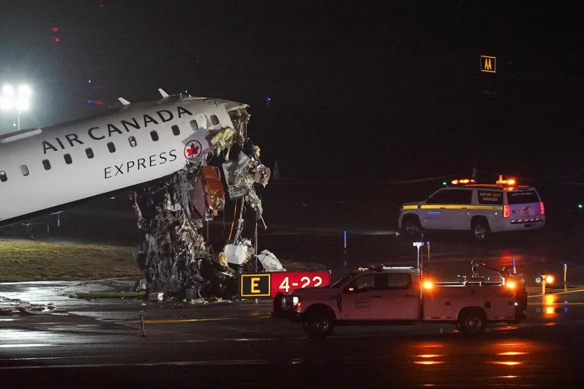 Damage to an Air Canada Express jet that had collided with a ground vehicle at New York's La Guardia Airport in Queens, New York, US on March 23, 2026. 