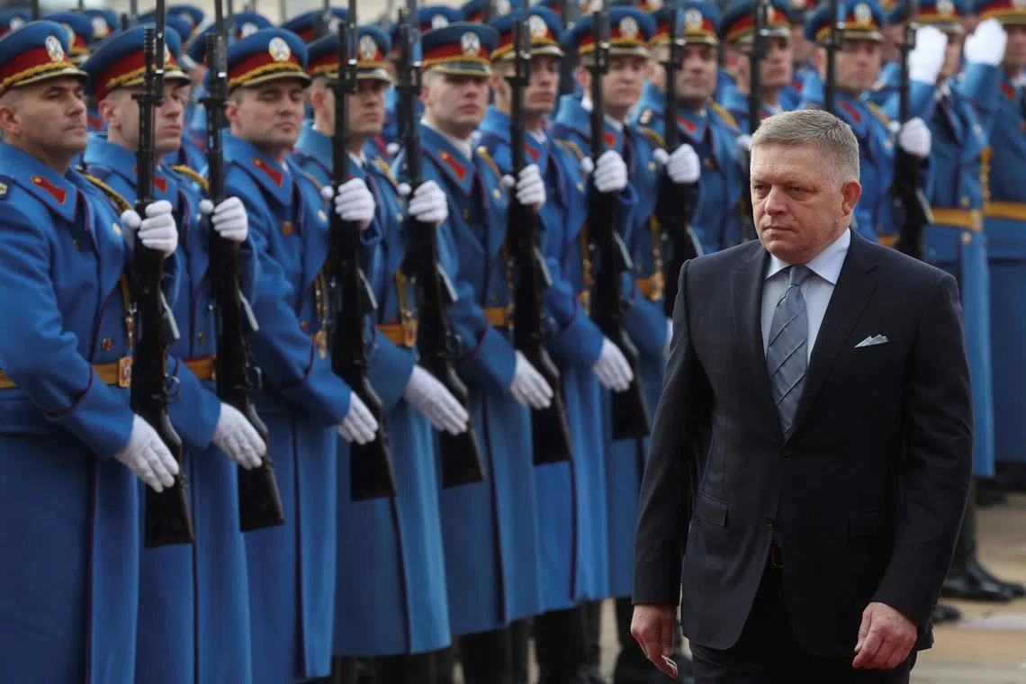 FILE PHOTO: Slovak Prime Minister Robert Fico inspect a guard of honour prior his meeting with Milos Vucevic Serbia Prime Minister, in Belgrade, Serbia, November 21, 2024. REUTERS/Zorana Jevtic/ File Photo