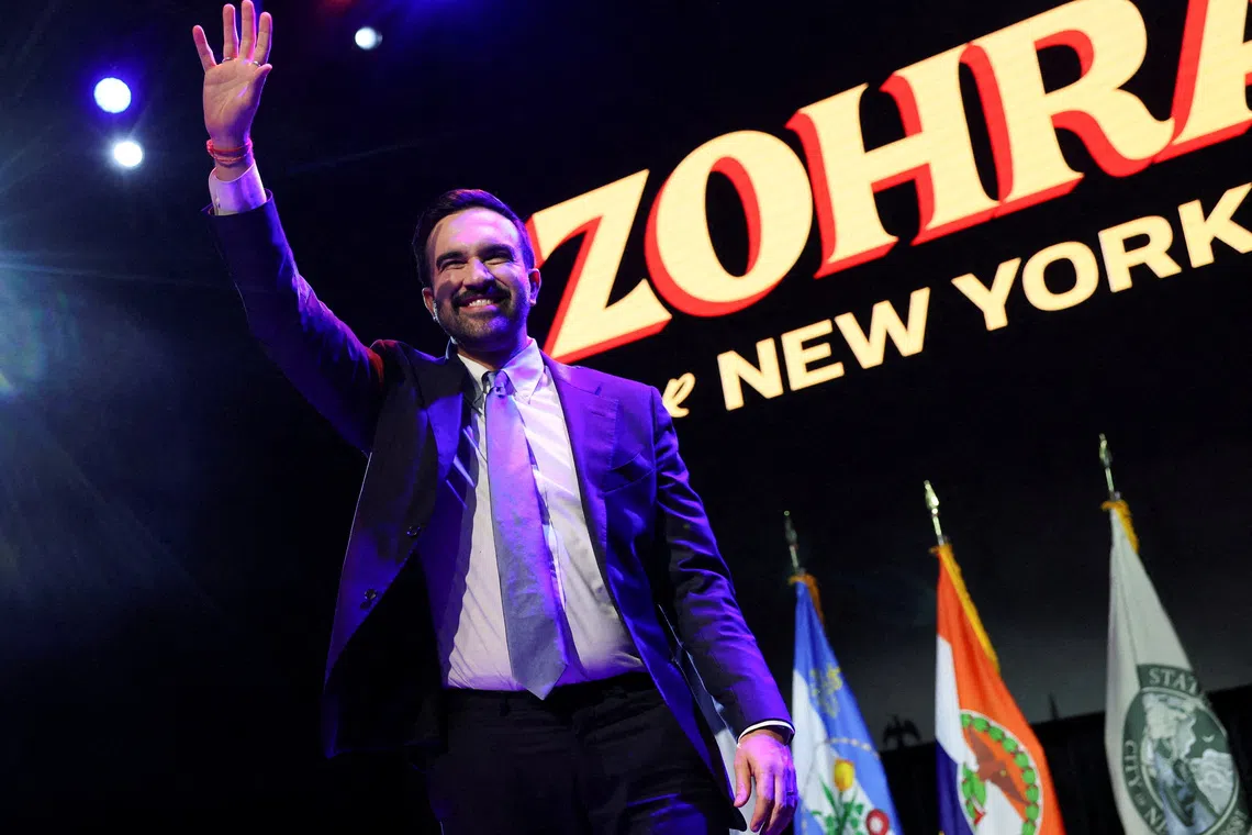 Democratic candidate for New York City mayor Zohran Mamdani waves on stage after winning the New York City Mayoral race, at his election night rally in the Brooklyn borough of New York City, November 4.  REUTERS/Shannon Stapleton