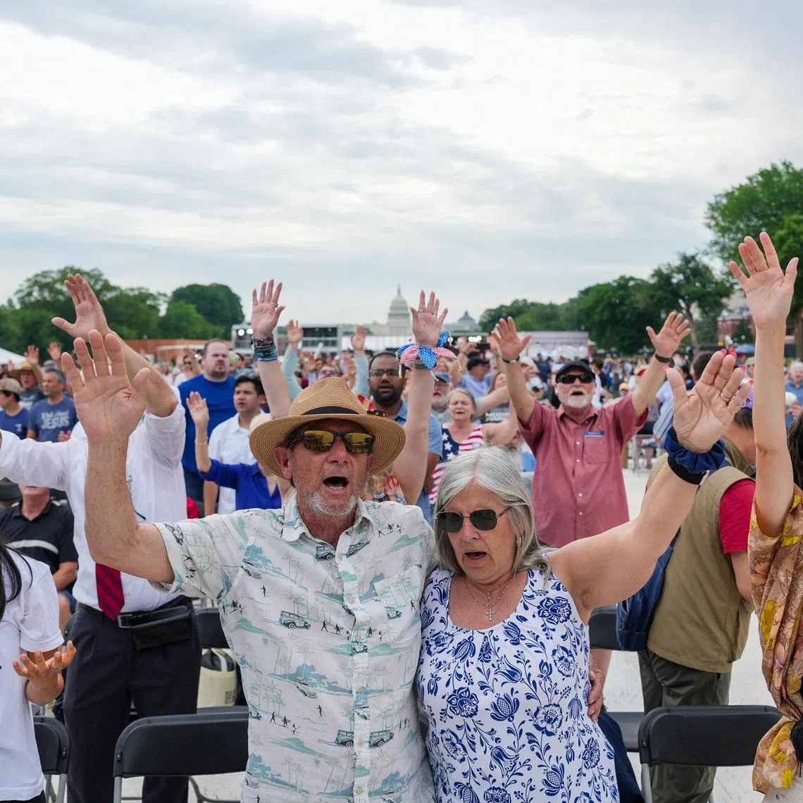 Attendees participate in Rededicate 250: National Jubilee of Prayer, Praise & Thanksgiving on the National Mall in Washington, D.C., U.S., May 17, 2026. REUTERS/Eric Lee