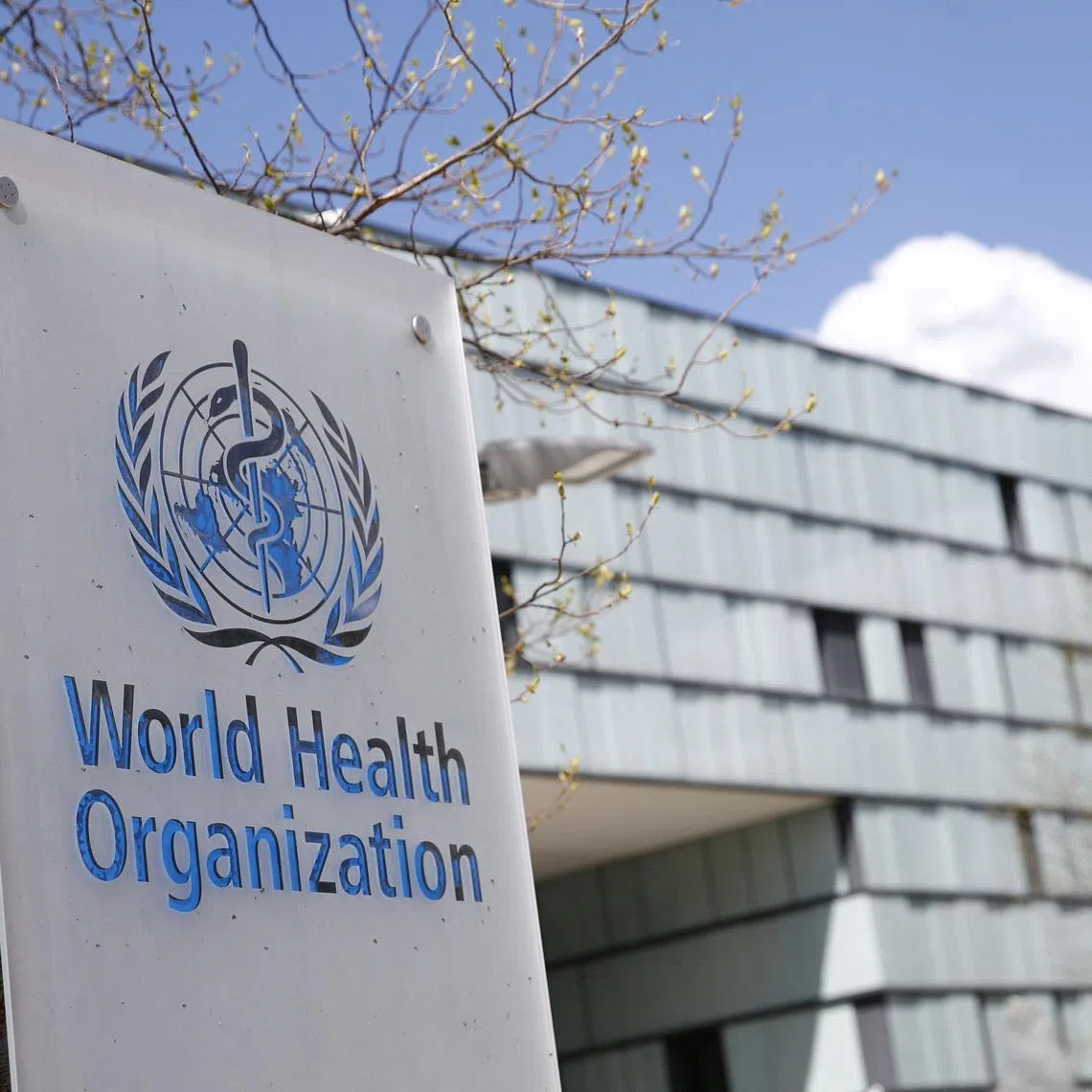 A logo is pictured outside a building of the World Health Organization (WHO) during an executive board meeting on update on the coronavirus disease (COVID-19) outbreak, in Geneva, Switzerland, April 6, 2021. REUTERS/Denis Balibouse