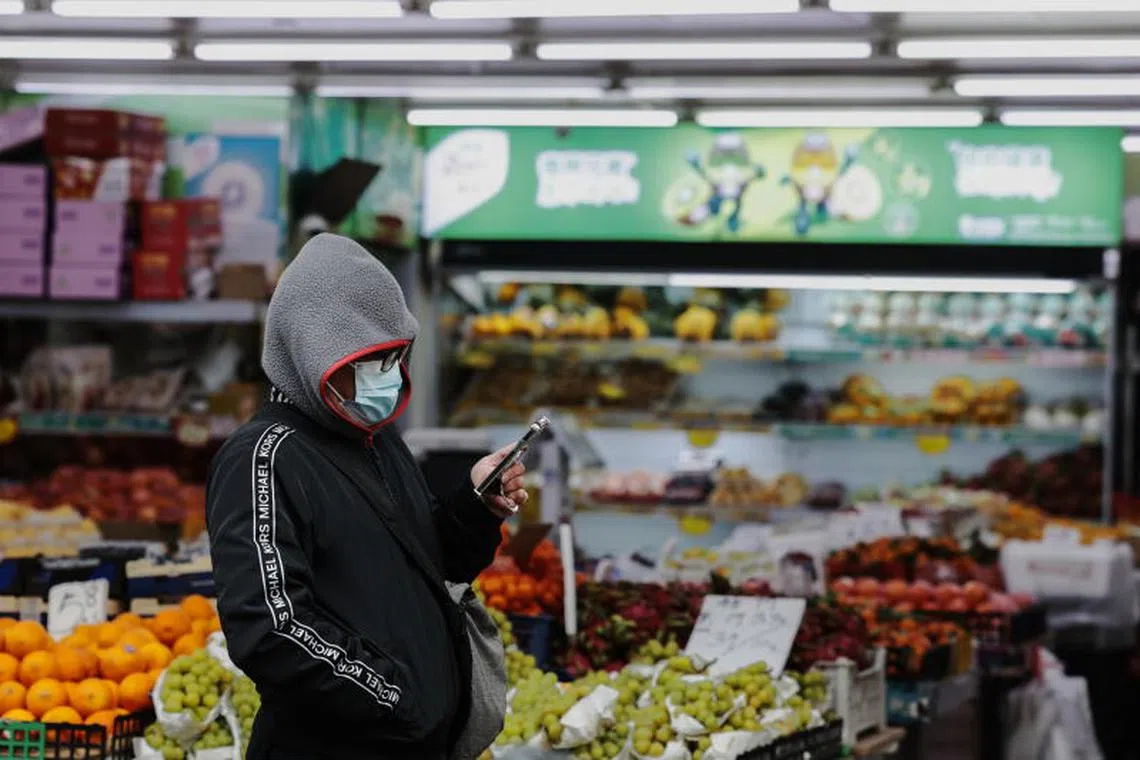 epa11767457 A person stands in a grocery shop in Shanghai, China, 09 December 2024 (issued 10 December 2024). China's trade surplus surged to 97.44 billion US dollars in November 2024 from 69.45 billion US dollars in the same period a year earlier, surpassing expectations of 95 billion US dollars. It was the largest trade surplus since June, as exports grew while imports fell. EPA-EFE/ALEX PLAVEVSKI