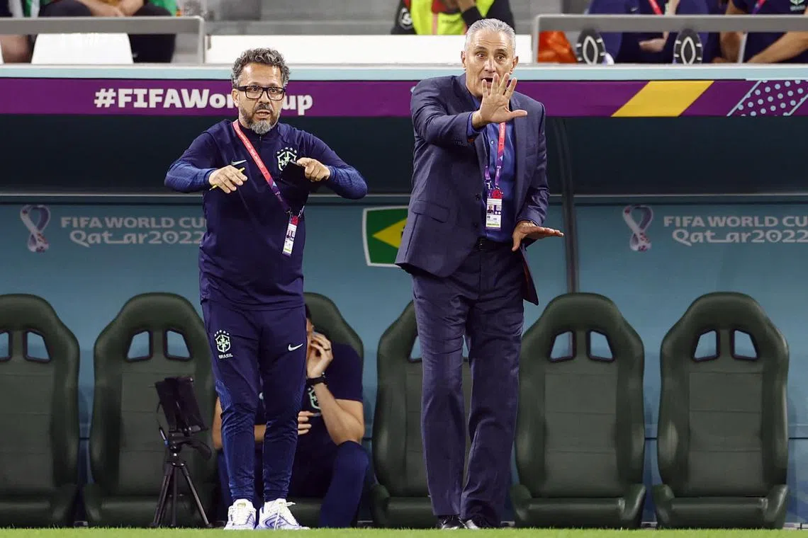 Brazil coach Tite (right) and assistant coach Cleiton Xavier during their World Cup match against Croatia.
