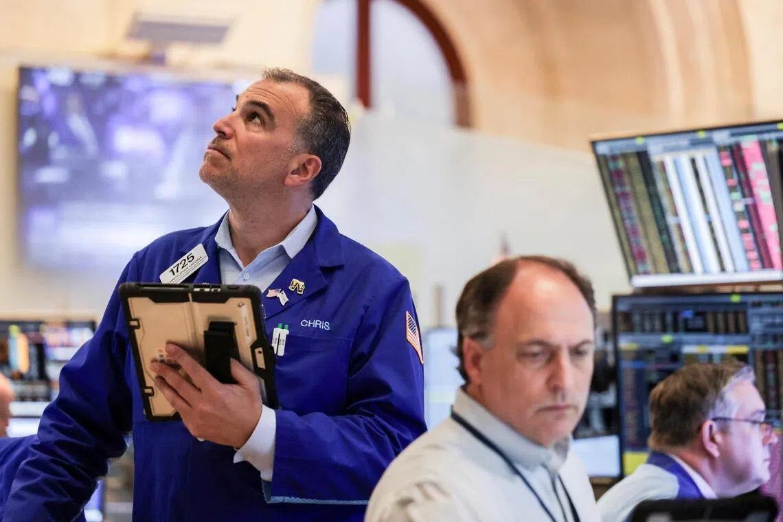 Traders working on the floor of the New York Stock Exchange, in New York City, on May 21.