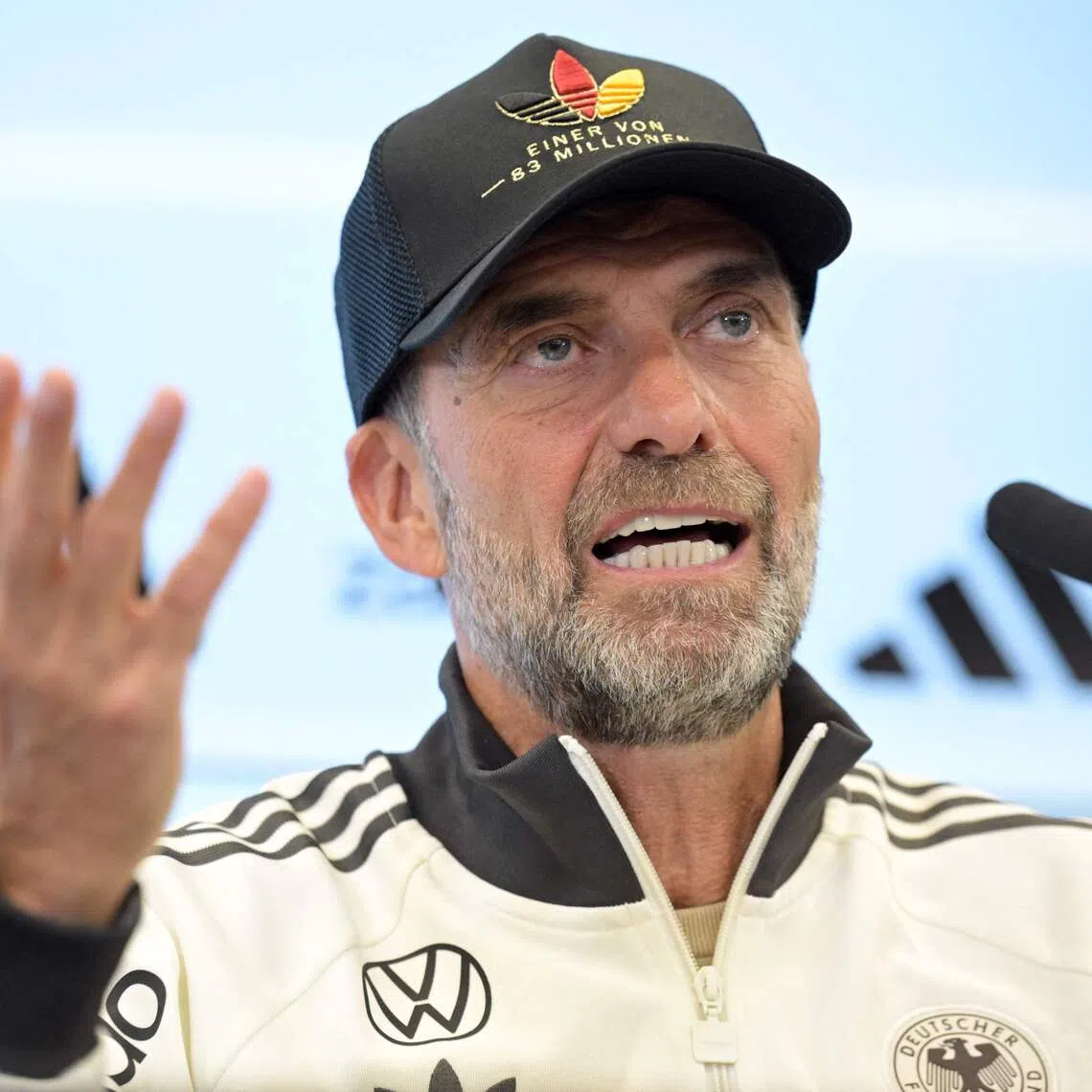 Germany’s National coach Juergen Klopp gestures as he addresses a press conference to announce his squad, on Sept 17 in Frankfurt, Germany.
