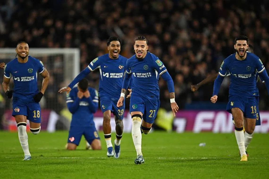 Soccer Football - Carabao Cup - Quarter Final - Chelsea v Newcastle United - Stamford Bridge, London, Britain - December 19, 2023 Chelsea's Malo Gusto celebrates after winning the penalty shootout REUTERS/Dylan Martinez