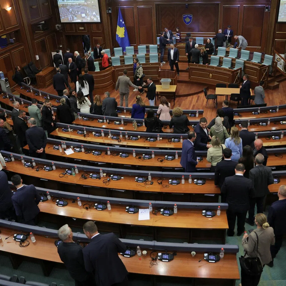 Members of the parliament leave the plenary session after failing to elect the new president at the parliament building in Pristina, Kosovo April 28, 2026. REUTERS/Valdrin Xhemaj