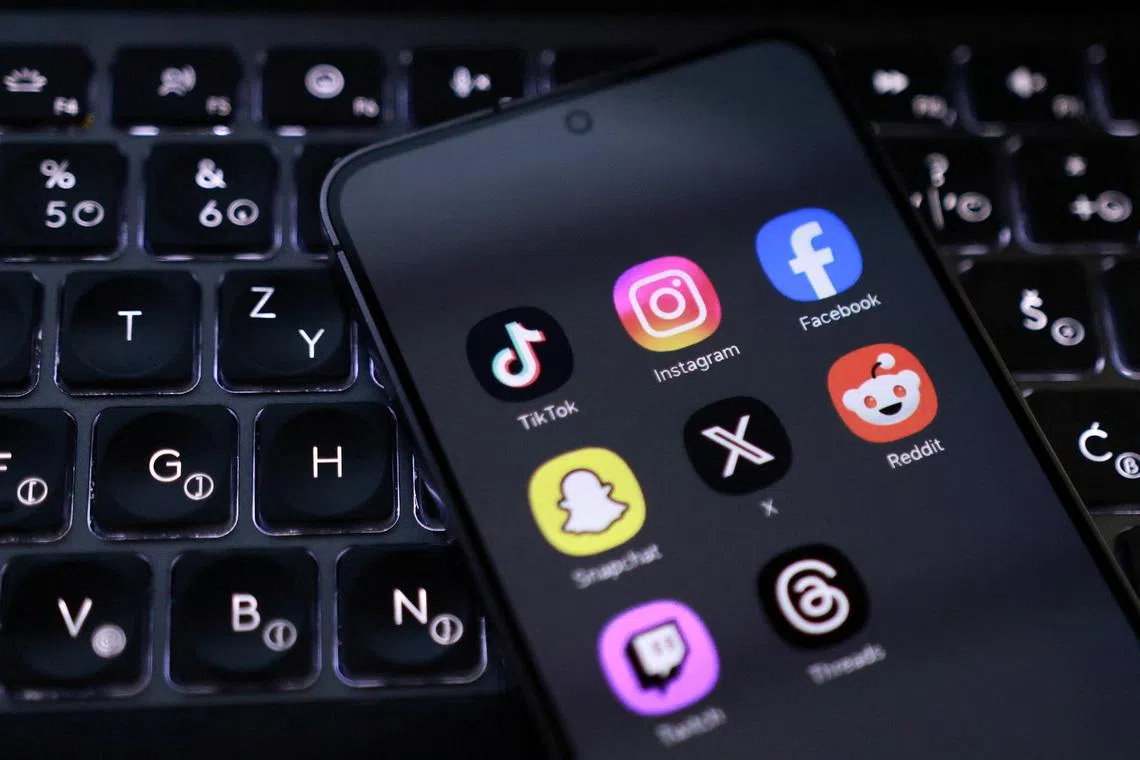 A smartphone with displayed social app icons in this illustration taken February 3, 2026.