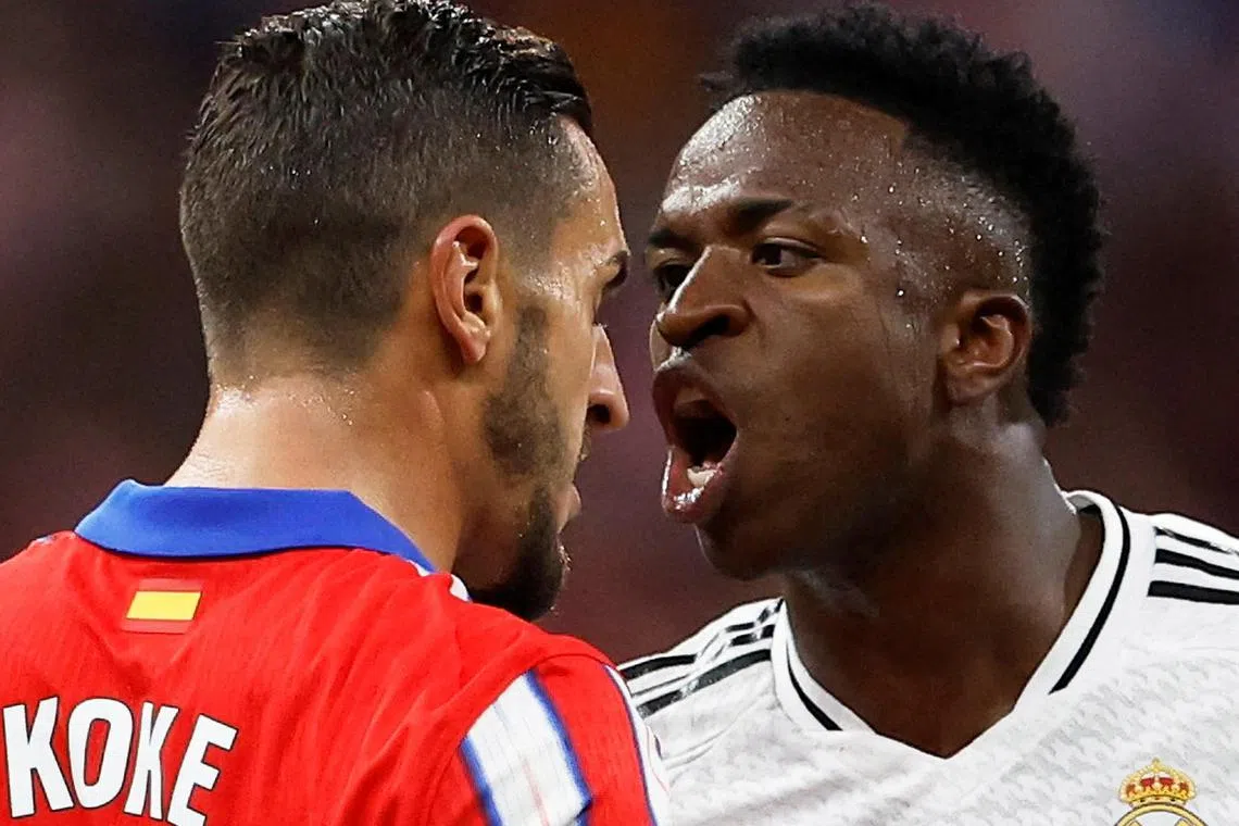Atletico Madrid's Koke (left) and Real Madrid's Vinicius Jr clashing during the Madrid derby on Sept 29 at the Metropolitano. The La Liga match ended 1-1.