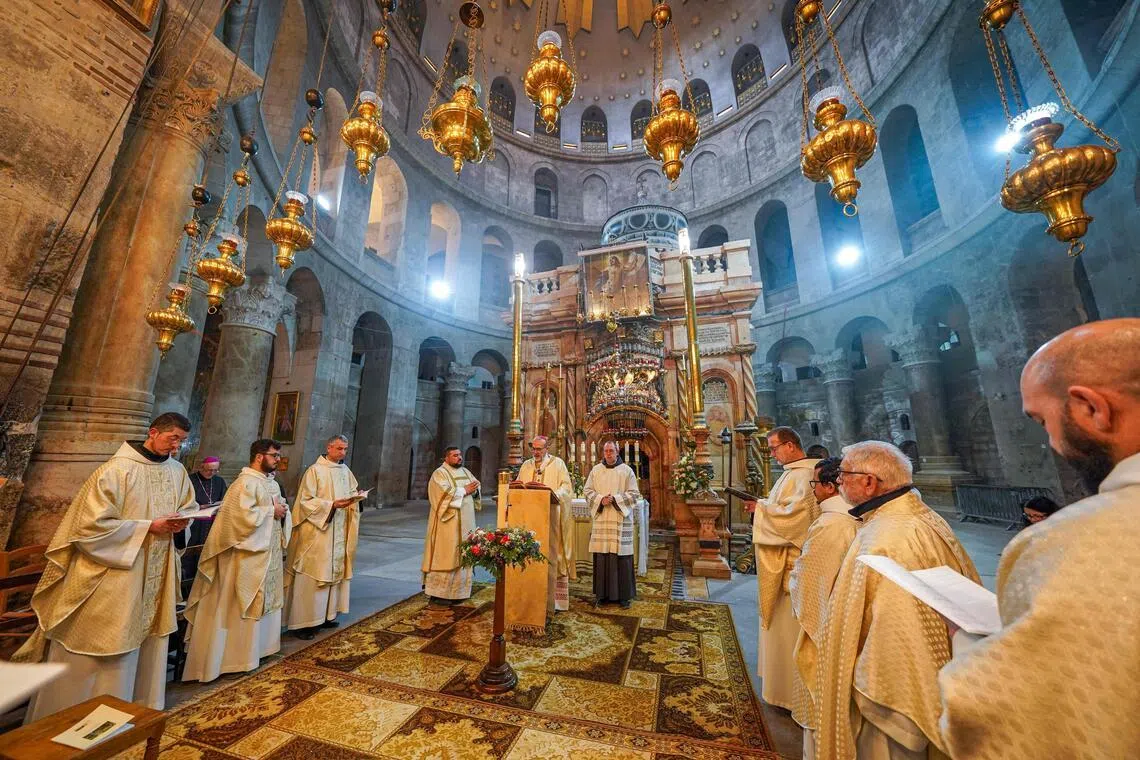 Latin Patriarch of Jerusalem, Cardinal Pierbattista Pizzaballa, leading the Easter Sunday Mass at the Church of the Holy Sepulchre in the old city of Jerusalem on April 5.