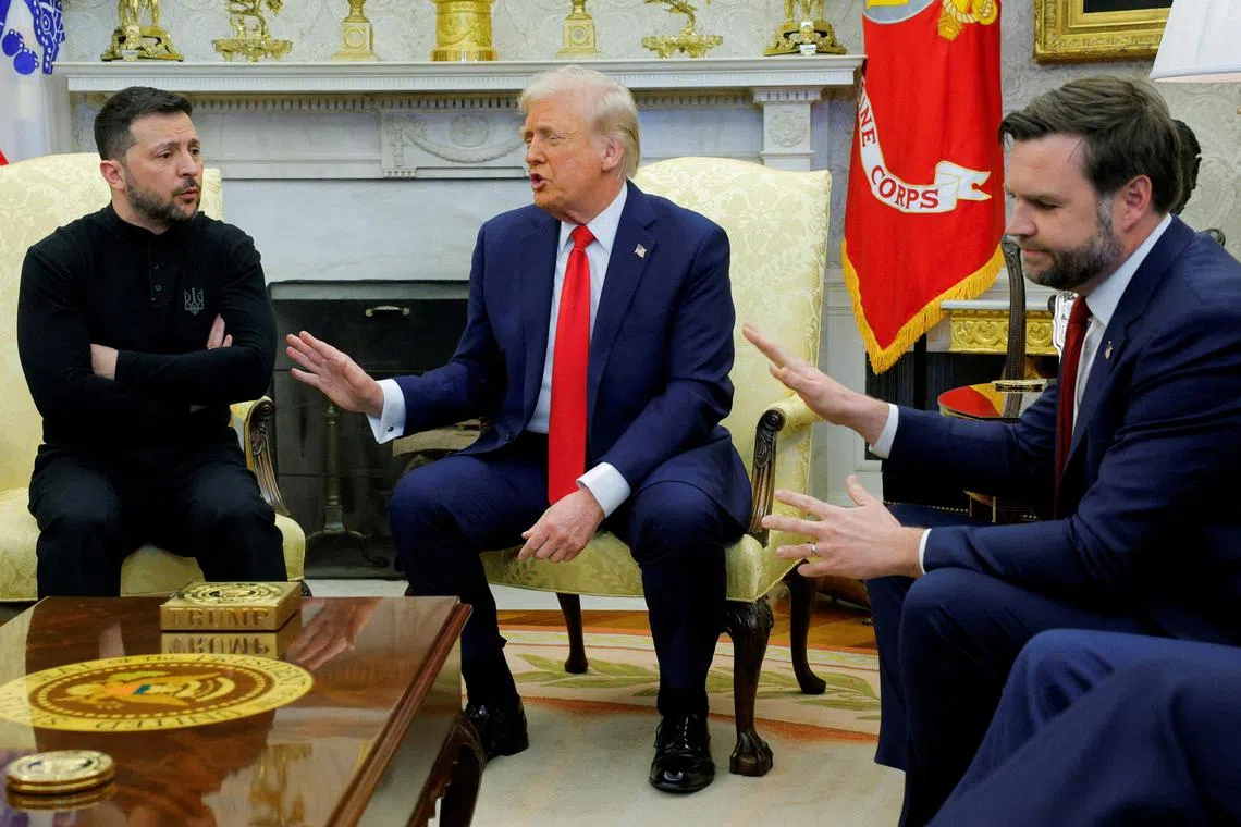 U.S. President Donald Trump meets with Ukrainian President Volodymyr Zelenskiy as U.S. Vice President JD Vance reacts at the White House in Washington, D.C., U.S., February 28, 2025. REUTERS/Brian Snyder
