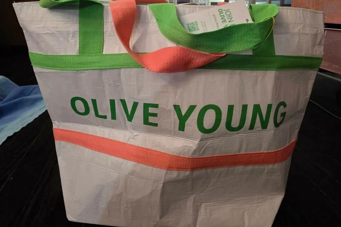 Olive Young’s $3 shopping bag becomes unlikely South Korea souvenir