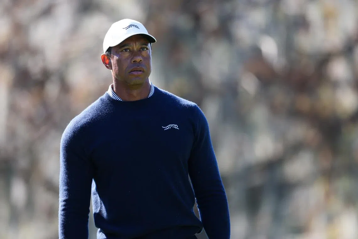 FILE PHOTO: Dec 21, 2024; Orlando, Florida, [USA]; Tiger Woods gets ready to tee off the ninth hole during the PNC Championship at The Ritz-Carlton Golf Club. Mandatory Credit: Nathan Ray Seebeck-Imagn Images/File photo
