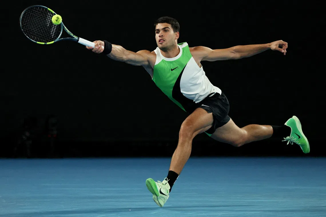 FILE PHOTO: Tennis - Australian Open - Melbourne Park, Melbourne, Australia - January 18, 2026 Spain's Carlos Alcaraz in action during his first round match against Australia's Adam Walton REUTERS/Hollie Adams/File Photo