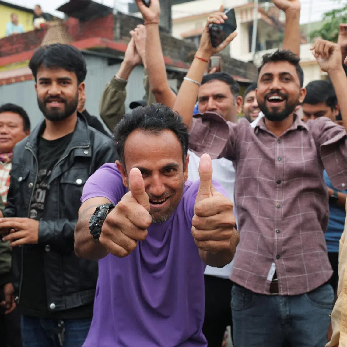 Supporters of Rastriya Swatantra Party (RSP) celebrate after election officials announce that Balendra Shah, a rapper-turned-politician and the prime ministerial candidate for RSP, is leading, outside a counting centre in Damak, Jhapa district, Nepal, March 7, 2026. REUTERS/Adnan Abidi